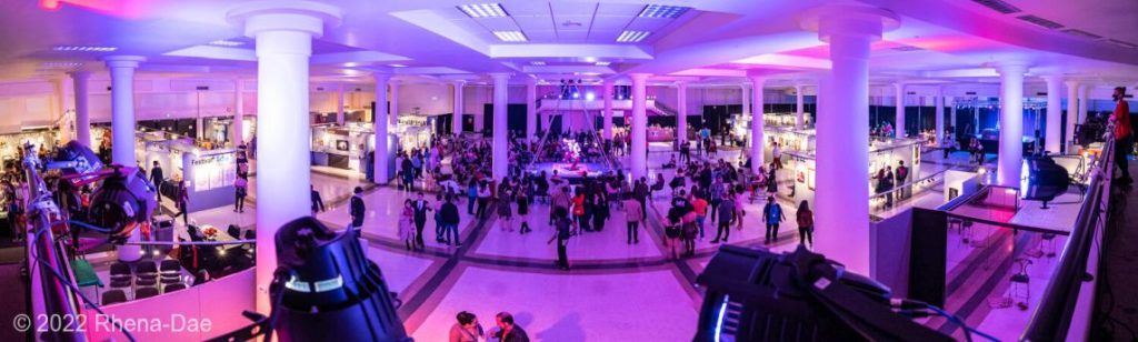 2024 Friday Schedule: Panoramic shot of the Seattle Erotic Art Festival at the Seattle Center Exhibition Hall.