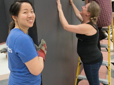 SEAF volunteers setting up the walls for SEAF 2018